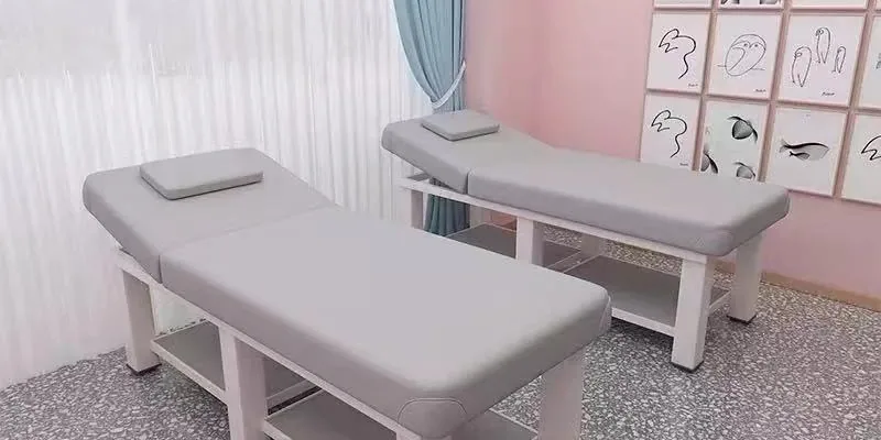 Esthetician bed with storage drawers built into the frame