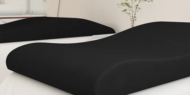 Memory foam lash bed topper on a treatment table for client comfort